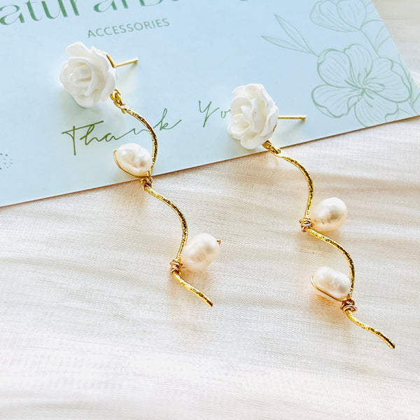 Boucles d'oreilles perles roses blanches